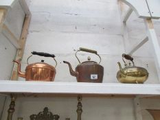 2 copper kettles and a brass kettle