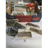 A box of assorted postcards