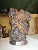 A carved African figure group