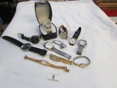 A quantity of watches including Tissot etc