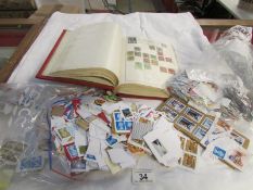 An album of stamps and a large quantity