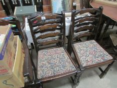 A set of 6 ladderback dining chairs
