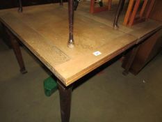 An oak extending dining table