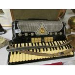 A 1930's Marinucc accordian in case once owned by Doris Christison who worked for Lew Grade and