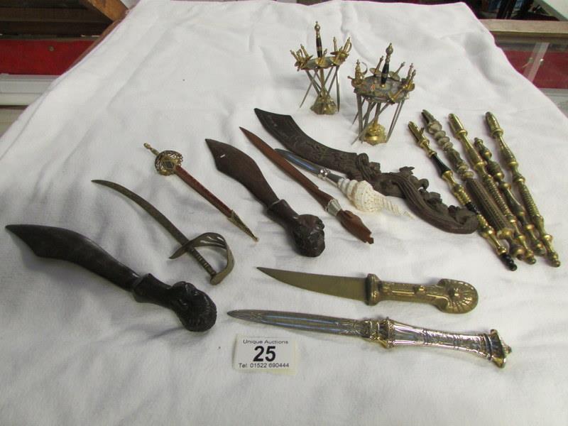 A mixed lot of letter openers, fan handl