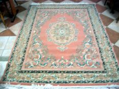 A pink patterned rug, 225 x 165 cm
Condition
The material is wool – machine made