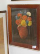 A still life of chrysathemums in terracotta jug