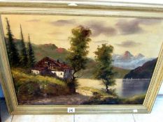 An oil on canvas lake and mountain scene signed Mancimi