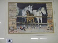 A framed and glazed watercolour of horses with foal signed Debbie Johnson, image 29cm x 20cm,
