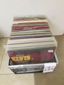 A box of LP records including Elvis, Chuck Berry etc