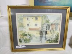 A framed and glazed watercolour of a watermill signed John Brookes, image 35cm x 24cm, frame 49cm