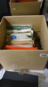 A box of EPs and 45rpm records from 1960s and 70s