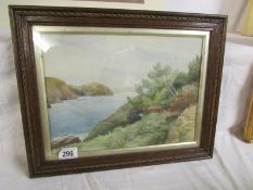 A framed and glazed watercolour lake scene signed V Leach 1933, image 33cm x 24cm, frame 42cm x