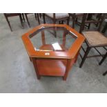 A good quality teak coffee table with gl