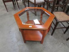 A good quality teak coffee table with gl