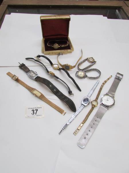 A quantity of ladies wrist watches inclu