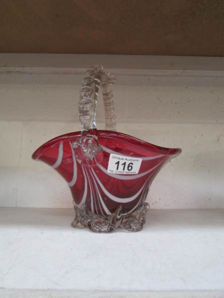 A Cranberry glass basket