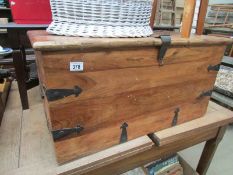 A blanket box with metal mounts