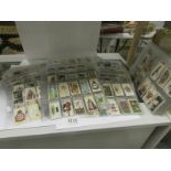 Approximately 2000 cigarette cards, Play