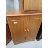 A teak cabinet by Morris of Glasgow