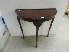 A D shaped hall table