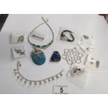 A mixed lot of silver and other necklace