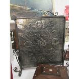 An Art Nouveau wrought iron firescreen w