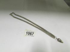 A silver chain marked 925 with pendant,