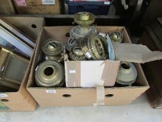 A box of oil lamp parts