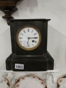 A slate mantel clock