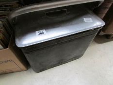 A metal box with handle
