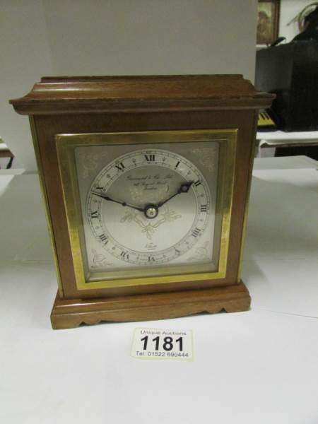 A Garrard mantel clock with platform esc