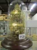 A brass skeleton clock of Big Ben under