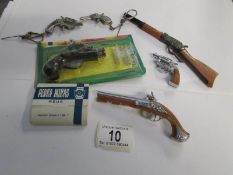 A quantity of toy pop guns including pis