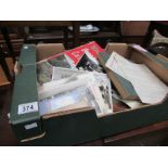 A box of ephemera, postcards etc