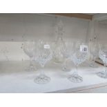 A glass decanter and 8 wine goblets