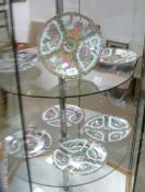 7 hand decorated Oriental plates