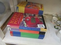A quantity of Harry Potter books includi