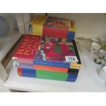 A quantity of Harry Potter books includi