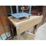 A pine drop leaf table