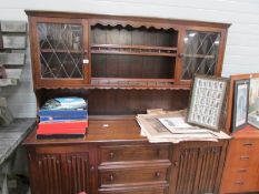 An oak priory style dresser