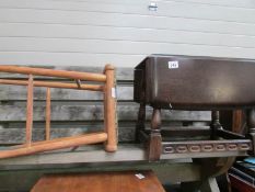 A small drop leaf table and a stool