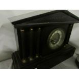 An 8 day mantel clock with pillars