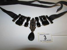 A black and marcasite necklace/belt