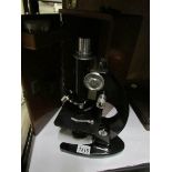 A cased microscope