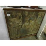 An oak tapestry fire screen