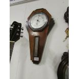 An Art deco barometer, glass a/f