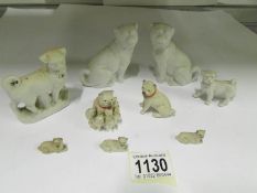 A quantity of bisque pug dogs