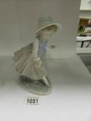 A Lladro figure of a girl