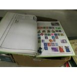 A box of world stamp albums